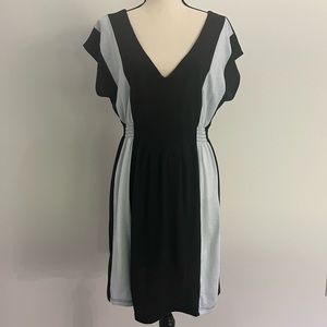 Soft and stretch dress/swim suit cover up.